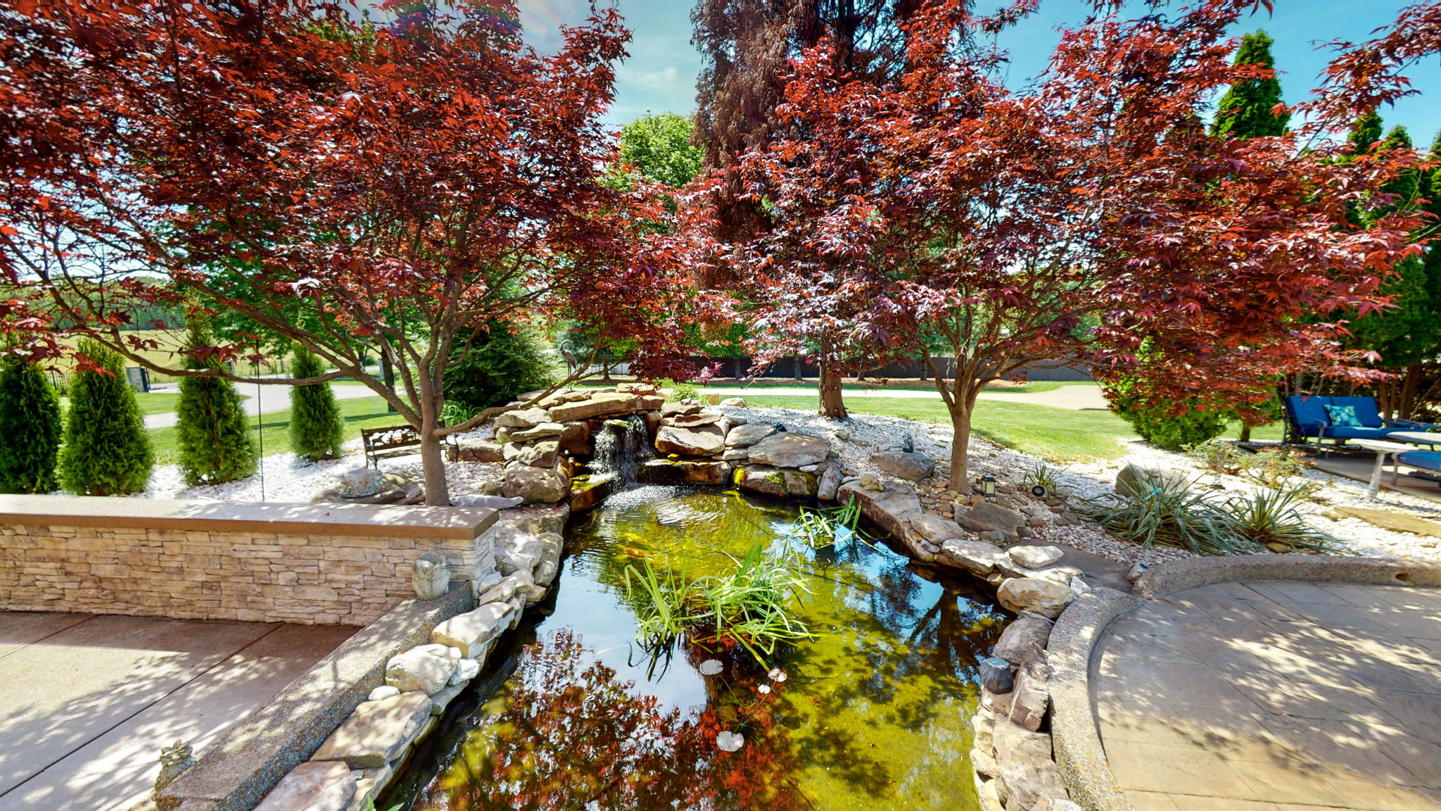 Only a few steps away from the seating/ hot tub area is the beautiful Koi pond.  You have to see this property to get the true feel of the amazing thought and attention to details that has been put into everywhere you look.