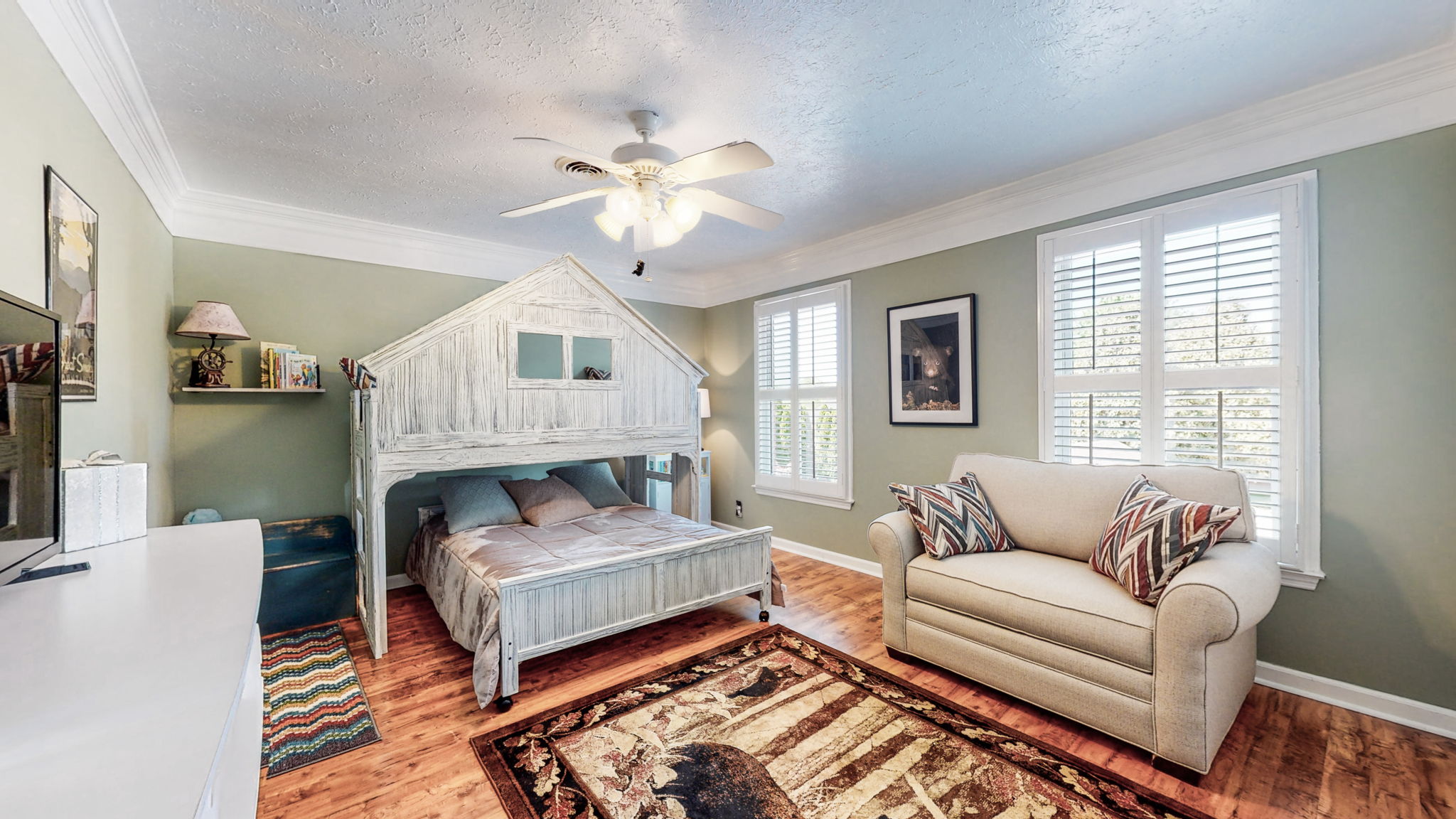 What kid would not enjoy this spacious, fun bedroom?!!