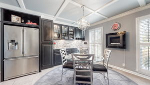 This kitchen/breakfast area features an electric fireplace.  The flames are literally steam vapor, just add water to the reservoir.  If that's not your perfect location, it is easily removed from the wall to relocate to another wall of your choosing.