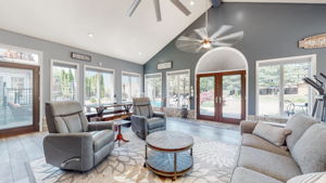 Welcome to this incredibly large sunroom number two, featuring tile floors, vaulted ceilings and stunning views of the resort-like backyard.