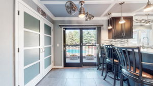 Notice the unique ceiling fan and light.