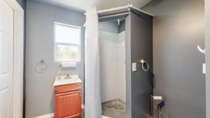 The pool house has a standup shower, toilet and sink convenient to the saltwater pool.  It also houses the pool filter and equipment in a separate room.