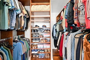 Primary Bedroom Walk-in Closet1a