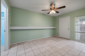 Unit C bedroom (white closed door is laundry closet)