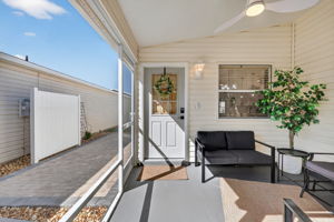 Front Screened Lanai and Entry with Side Paver Patio