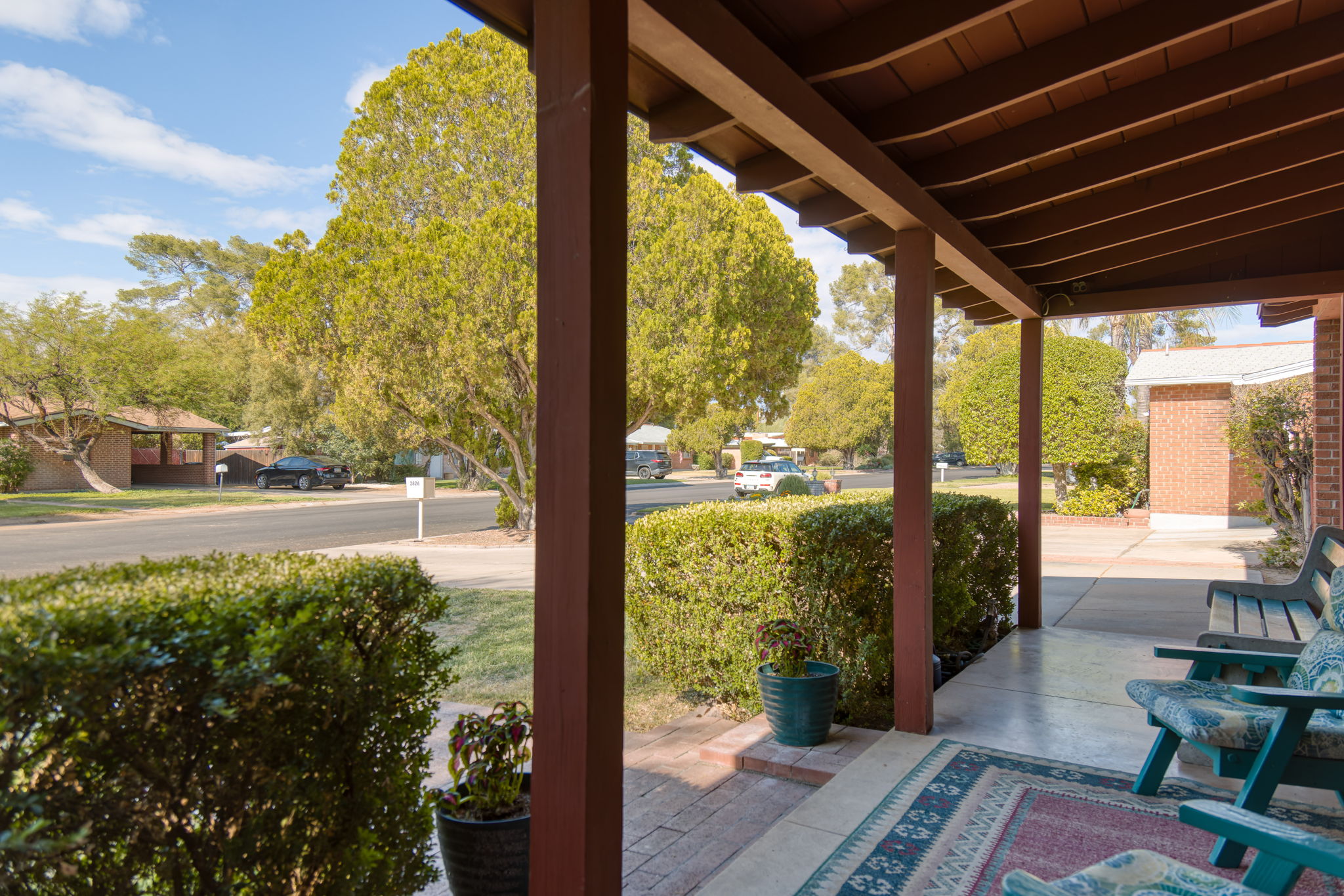 View from front porch of treelined streets