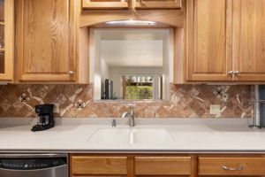 Corian counter tops/ oak cabinetry