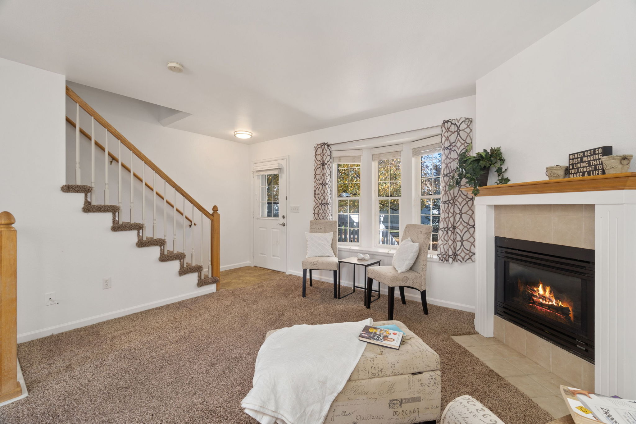 Cozy Main Floor Living Room with Gas Fireplace