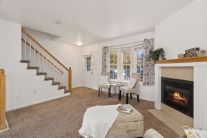 Cozy Main Floor Living Room with Gas Fireplace