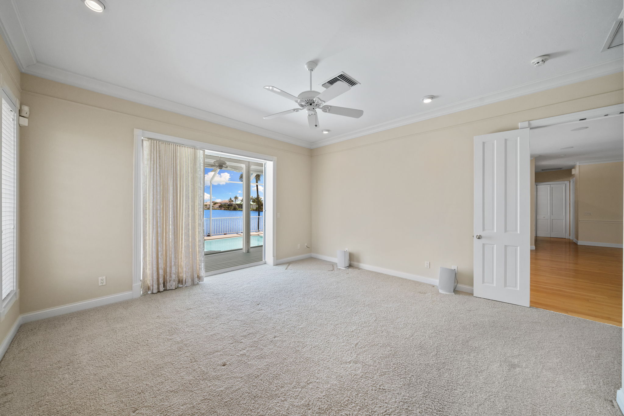 Primary Bedroom with Access to Lanai and Bay Views