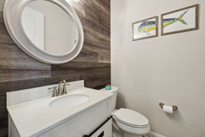 Powder Room with Shiplap Wall Accent