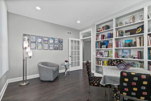 Den/Bedroom with Built-In Bookcases