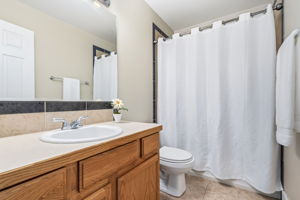 Full Hall Bathroom with Tiled Shower - Main Level