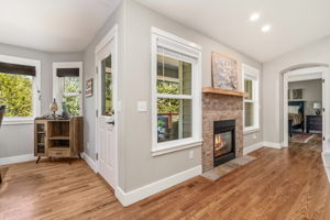 Access to the Back Deck and a Cozy Fireplace