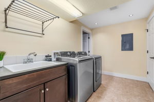 Laundry Area with Utility Sink