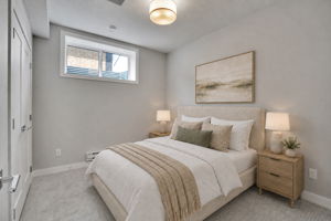 Virtually staged basement suite bedroom