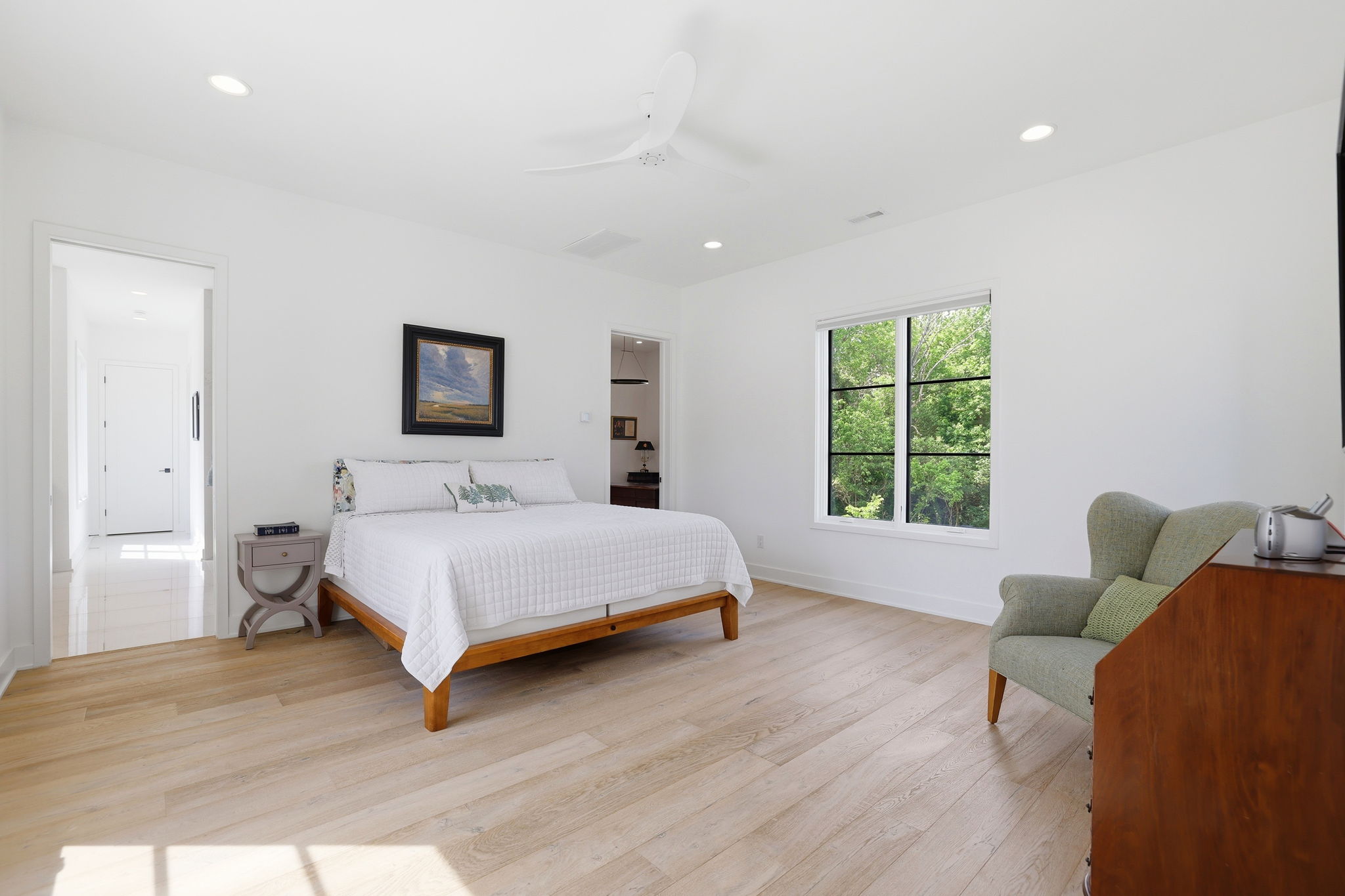 The expansive primary retreat occupies the entire second level - beginning with an very generous bedroom
