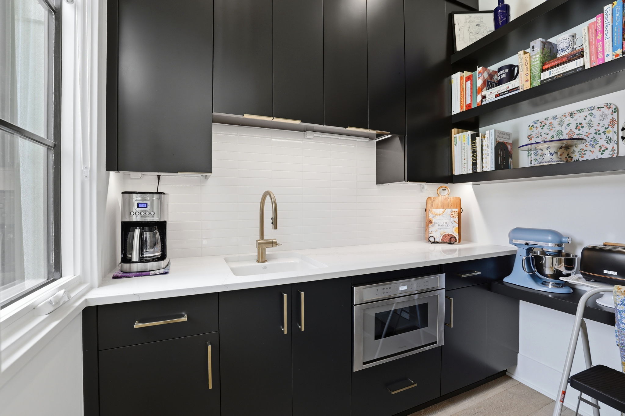 Well-Appointed Scullery with sink, microwave & ample storage