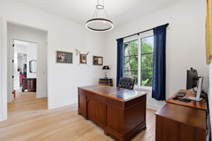 An ideal work-from-home retreat—bright, private, and thoughtfully positioned within the primary level