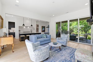 Seamless Indoor-Outdoor Living with Sliding Doors to Covered Porch