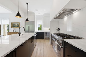 Peek to the bar area with built-in beverage refrigerator