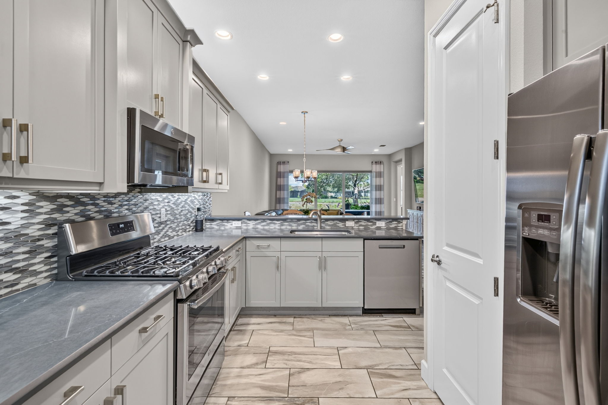 See the big pantry?? Gas stove and large single sink present, too.