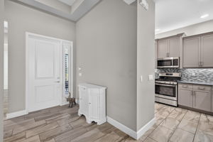 This stunning, upgraded plank tile is throughout this home!!!