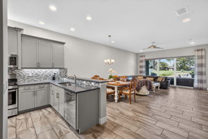 BEAUTIFUL, upgraded backsplash present here. Don't you love it? Soft close cabinetry, too!