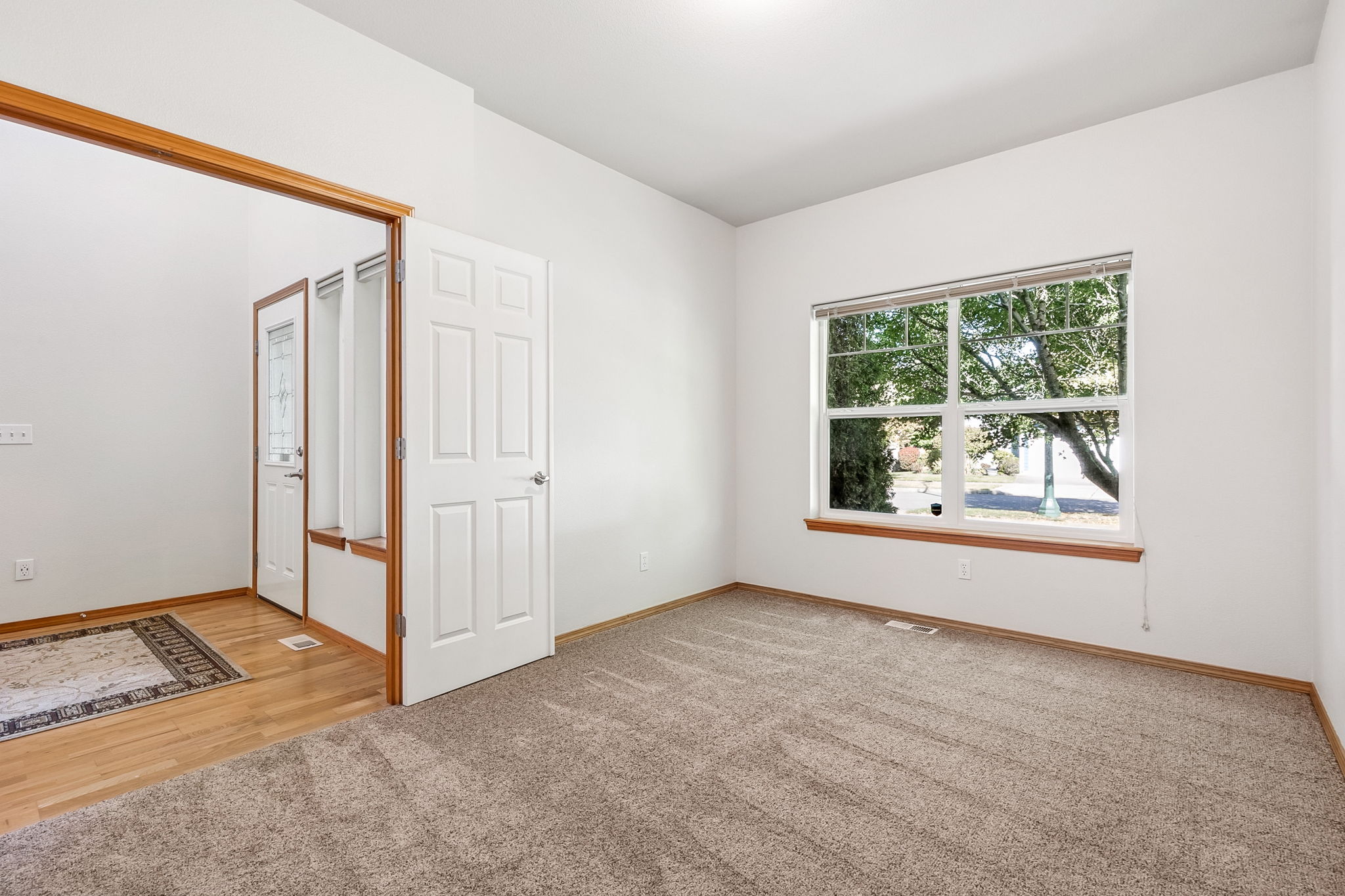 First bedroom just off entry has french doors.