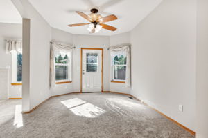 Dining room is open to kitchen and great room. It also provides access to the fenced back yard.