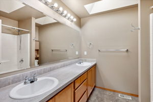 Full bathroom upstairs is shared by the two bedrooms.