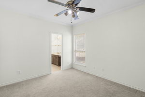 Middle secondary bedroom with Jack n Jill bathroom with each individual sink vanity.