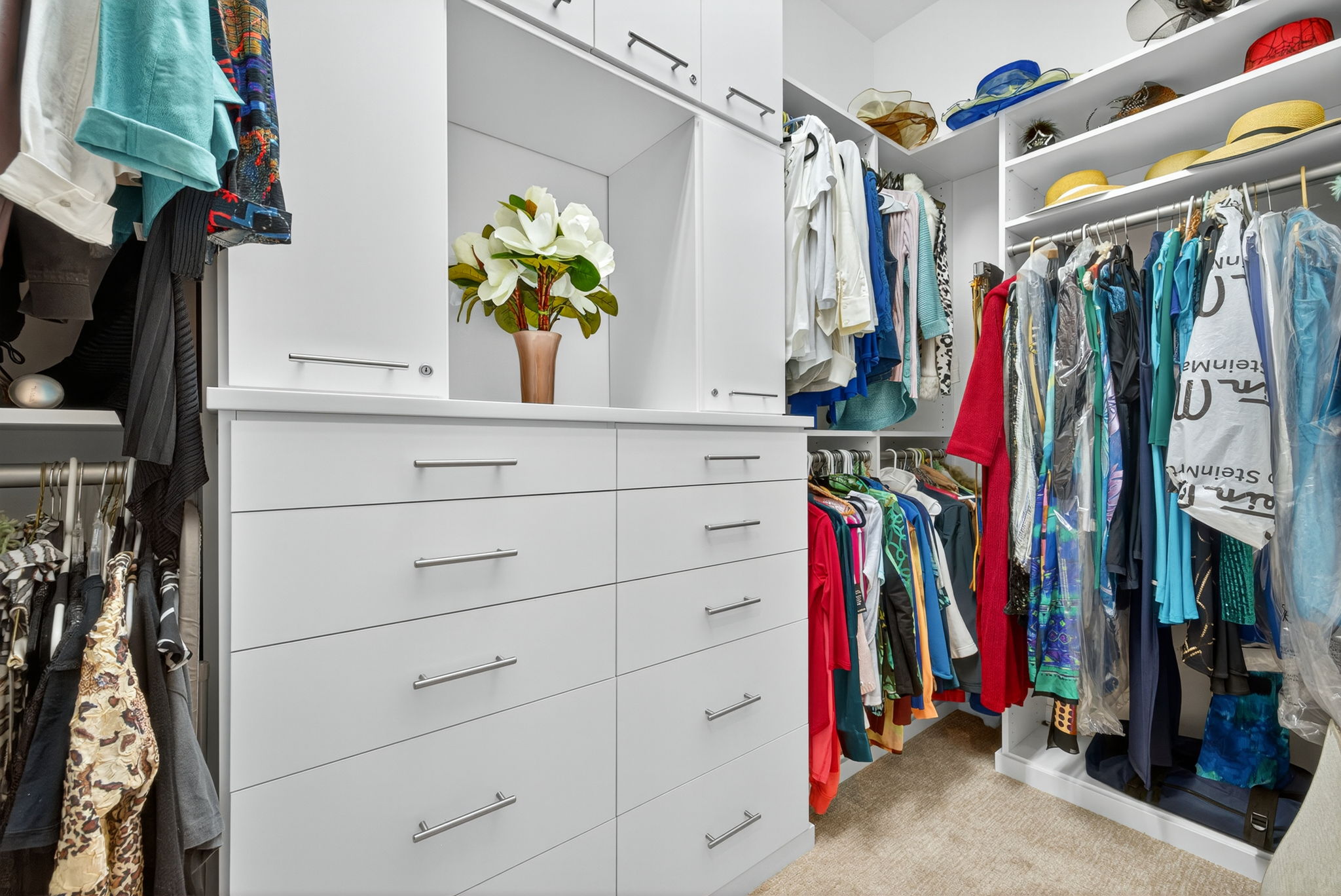 This walk-in closet has the added feature of locking jewelry cabinets!!! WOW!!!