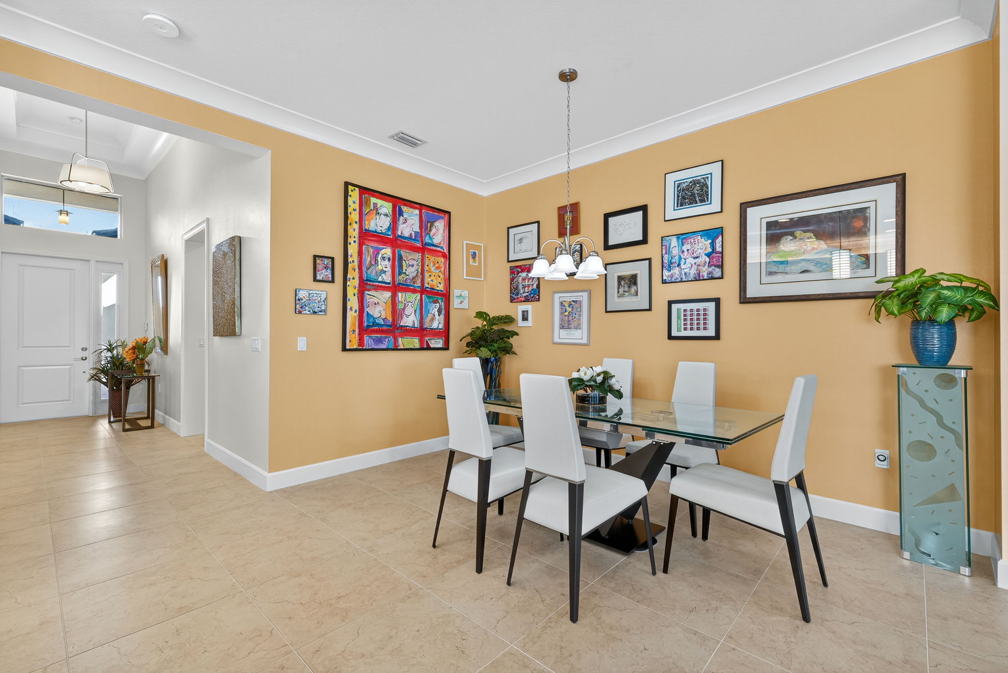 This more formal dining space comfortably seats 8 to 10 (leaf not opened on table in pix).