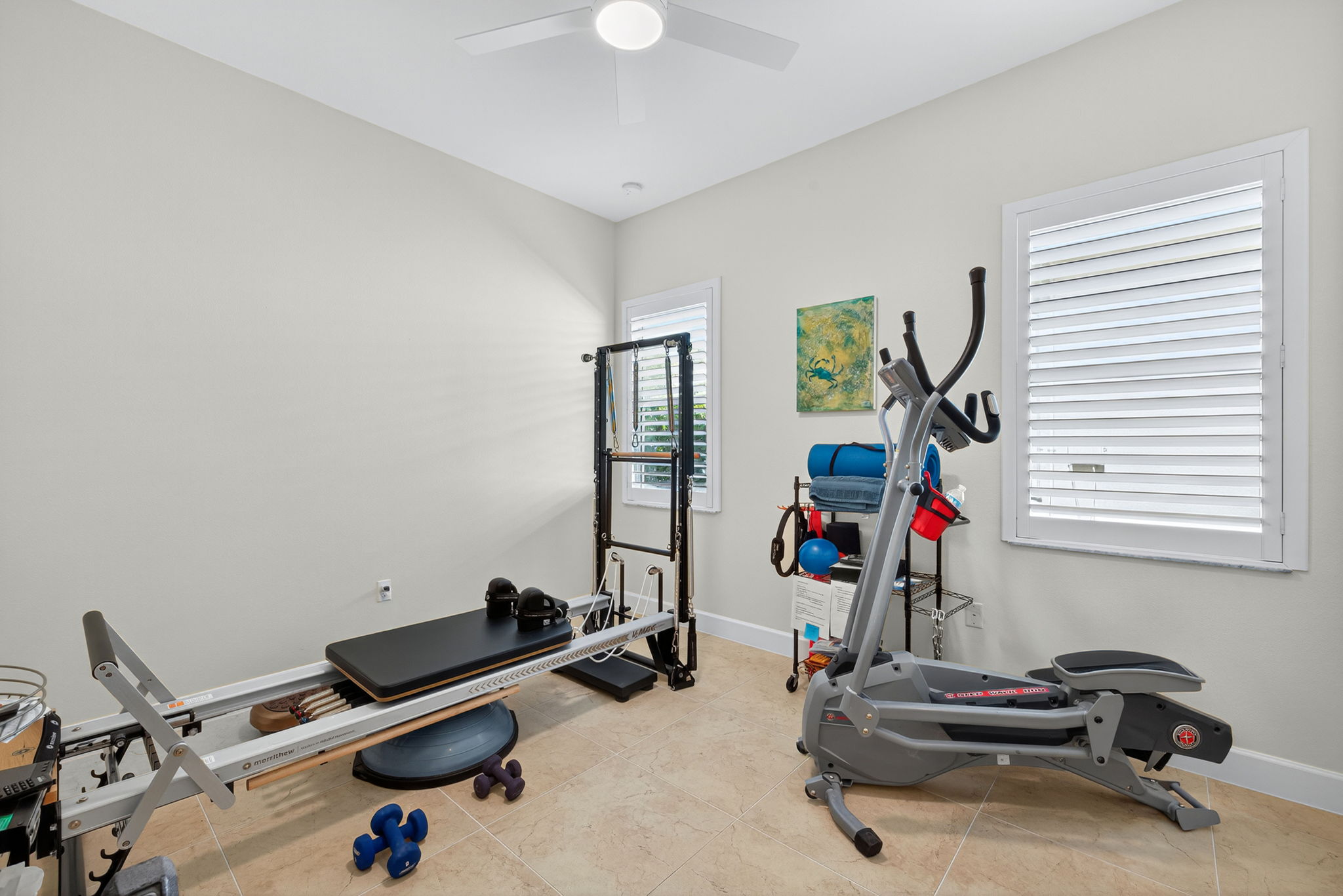 This is currently used as a home gym but is actually the 2nd primary suite with an ensuite bath and walk-in closet!