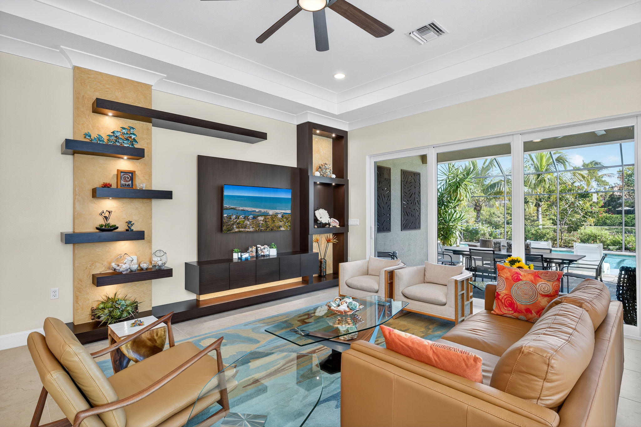 This custom accent wall is even more stunning in person...feel the artisan's handiwork in the Venetian plaster areas, soak in the lighted floating shelves to display your treasures, and appreciate the free floating shelf to hold your electronics.