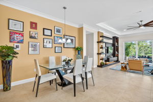 This angle captures the open floor concept of this Chandon. The primary bedroom suite is to the left between dining area and the great room.