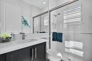This full bath features a walk-in shower!