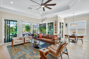 The six slider doors are impact resistant and ZERO CORNER SLIDING to completely open up the inside space to the outside space! This will spoil you for any future homes! Casual breakfast are also has doors to patio.