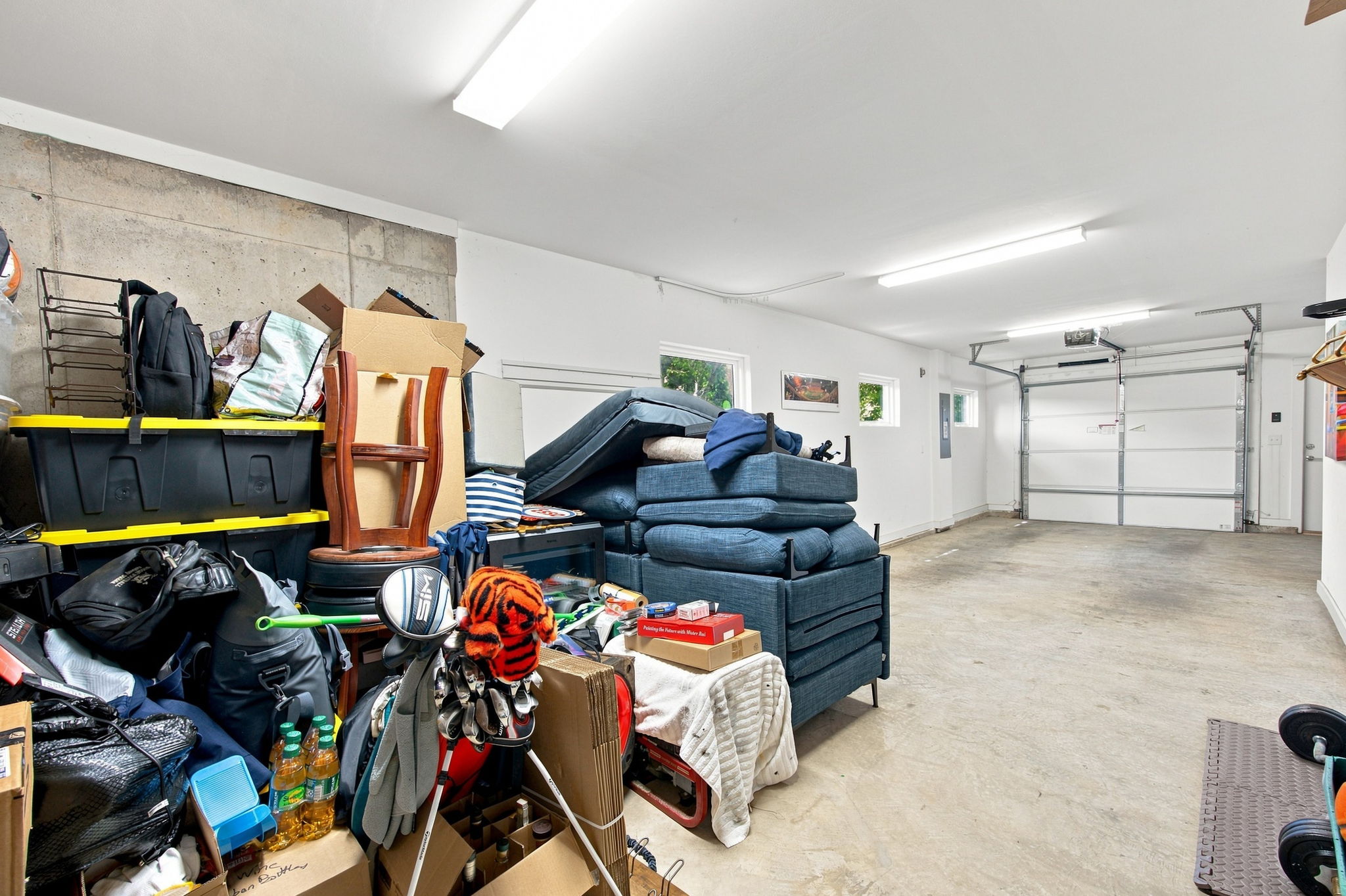 Enormous Two-Car Tandem Garage with Storage and Workshop Space