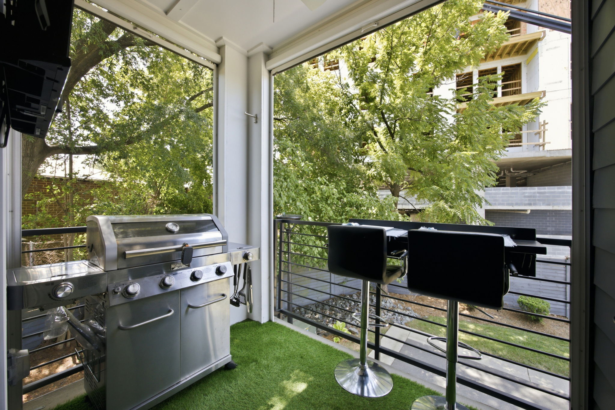 Covered Patio with Pull-Down Screens and Entertaining Bar