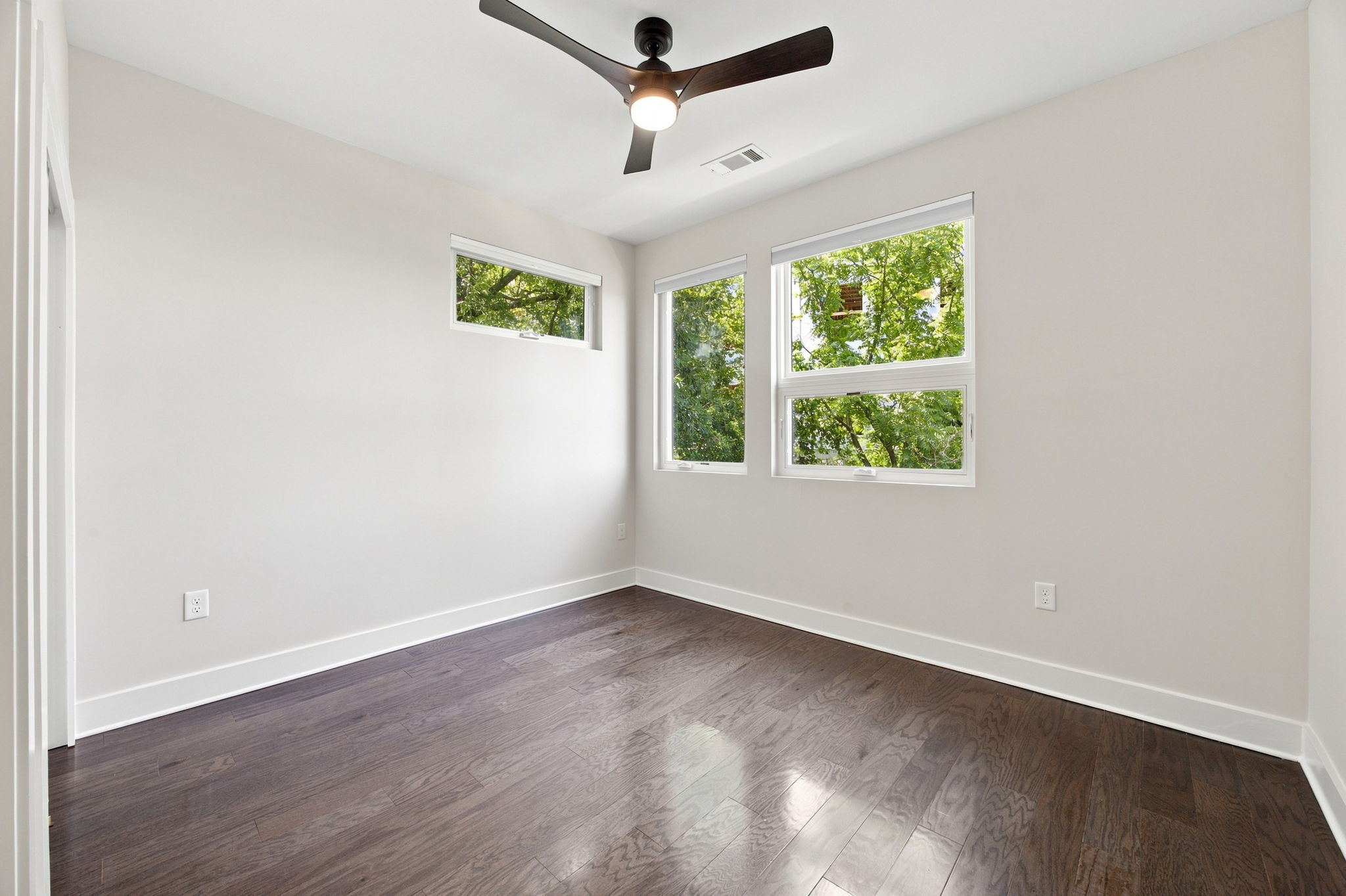 Second Bedroom Suite with Multiple Windows and Private Bathroom