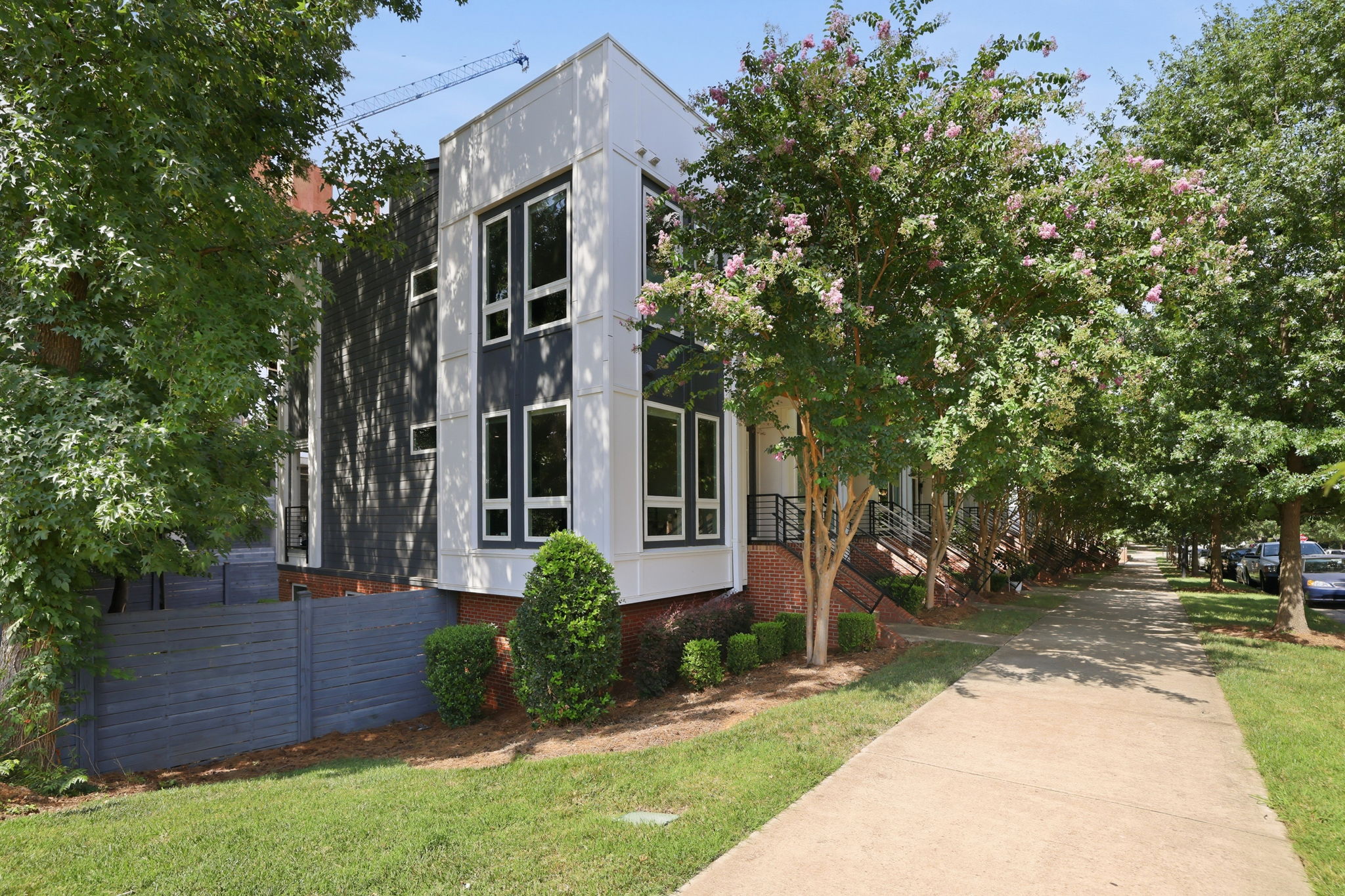 Side Exterior Showcasing the End-Unit’s Additional Windows