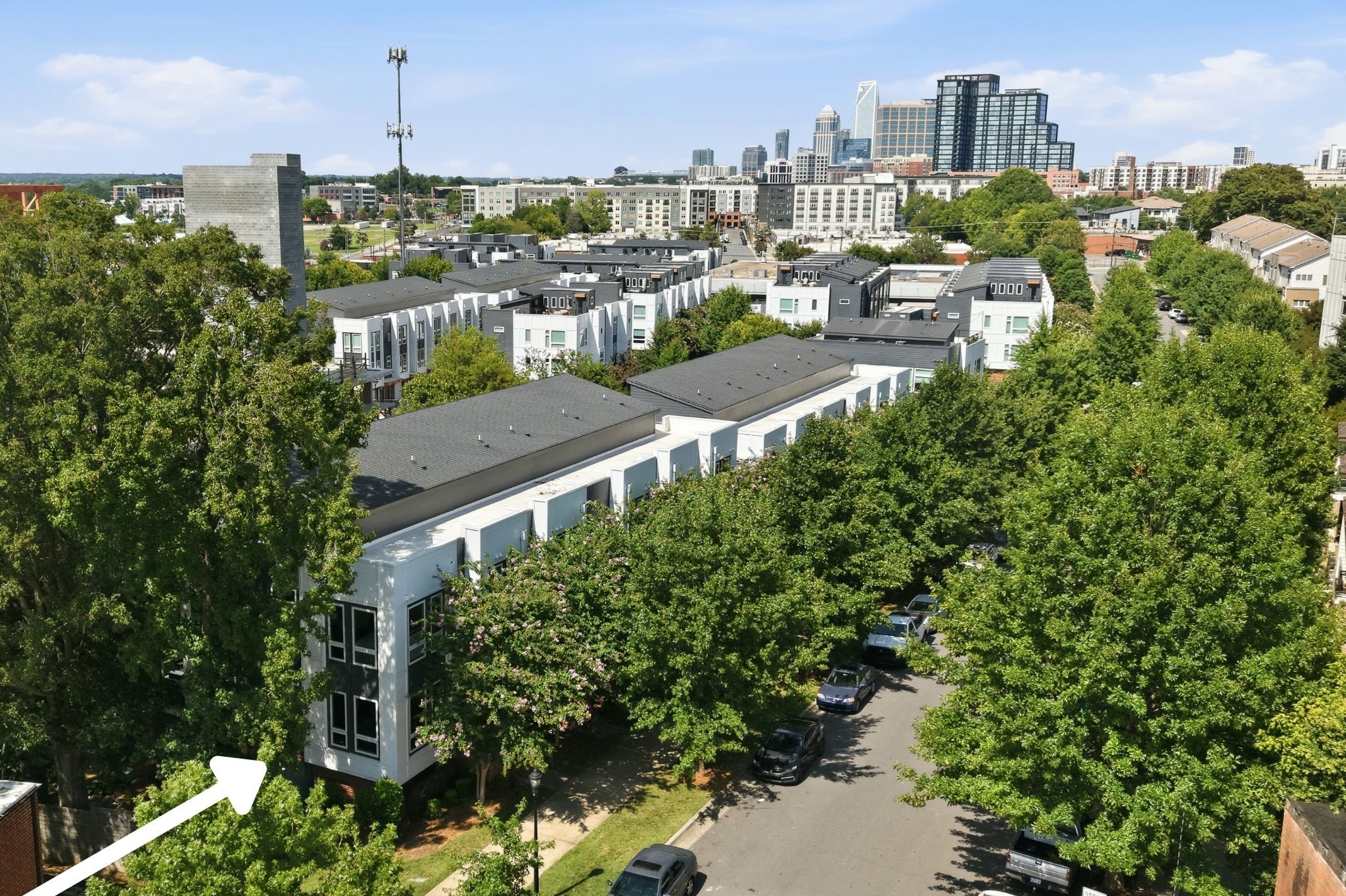 End-Unit Location with Uptown Skyline in the Distance