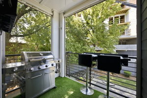 Covered Patio with Pull-Down Screens and Entertaining Bar