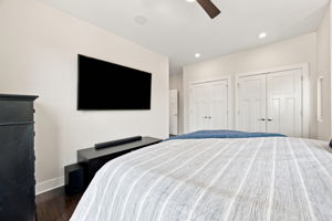 Primary Suite with Wood Floors and Flexible Furniture Space