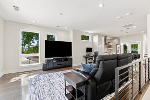 Open Living Area with Wood Floors and Recessed Lighting