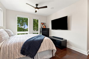Primary Suite with Wood Floors and Flexible Furniture Space