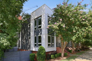 End-Unit Exterior Surrounded by Mature Trees