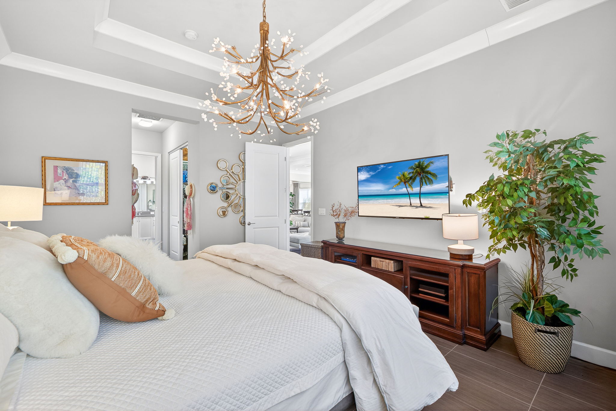 Looking into hallway with TWO walk-in closets that lead to the primary bath...